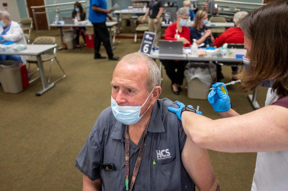 James Edwards, a 67-year-old facilities worker at Horry County Schools got his first dose of the Pfizer vaccine on Friday. Edwards said that though he was eligible for the vaccine earlier, he knew there were others that needed it. Horry County Schools employees began getting their first doses of the Pfizer vaccine on Friday at Conway Medical Center. March 12, 2021.