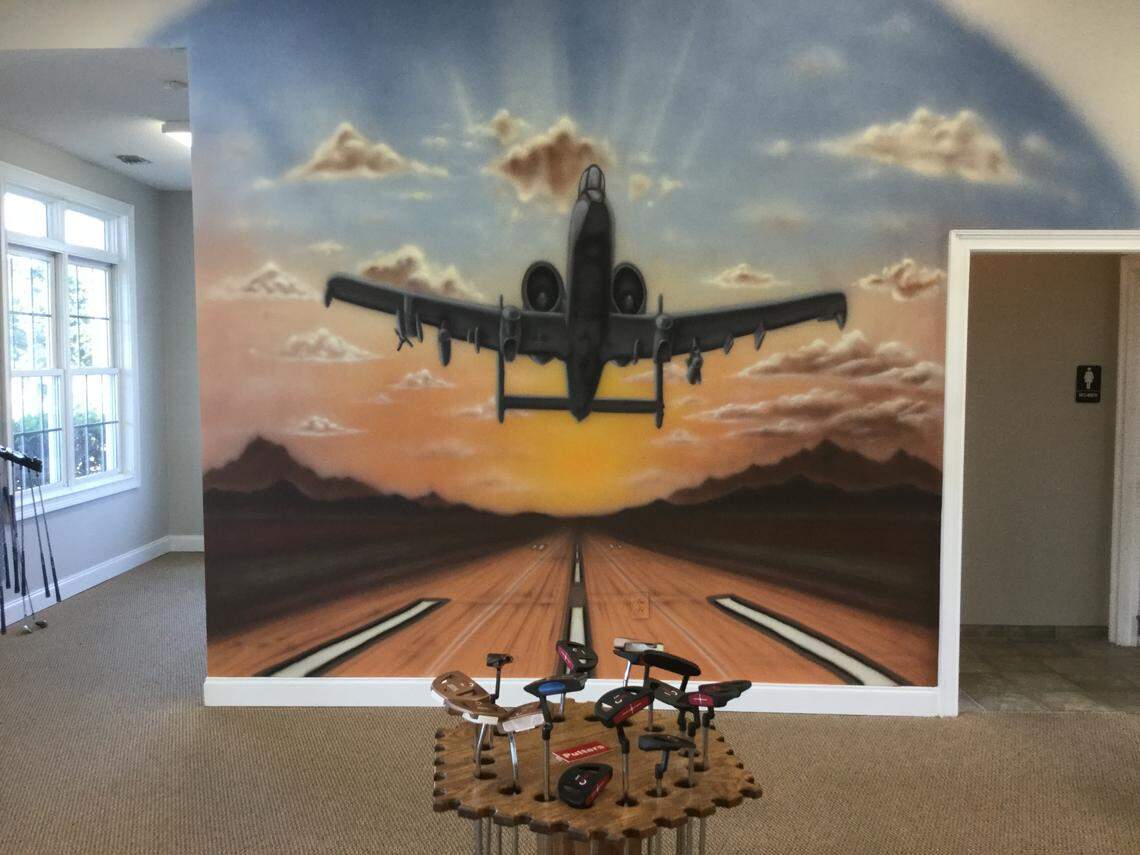 A wall features the painting of a military plane Monday in the clubhouse of The Aero Club Short Course par 3 golf facility, which opened Friday on U.S. 17 Business near Myrtle Beach International Airport. It is on the site of the former Midway Par 3, which closed in 2017. Oct. 5, 2020.