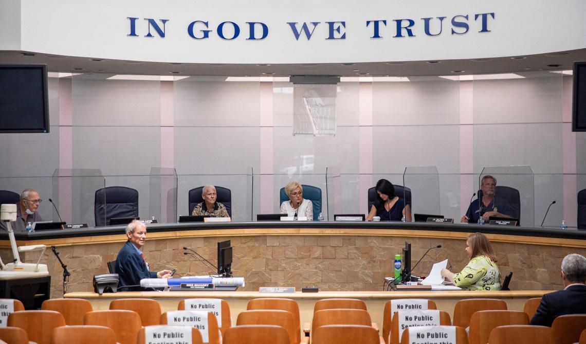 Chairs are reserved and shields placed between council members to protect from coronavirus infection at a City of North Myrtle Beach council workshop held on Wednesday. June 10, 2020