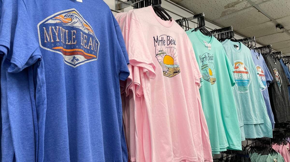 Myrtle Beach-themed T-shirts, like these at the Gay Dolphin on Ocean Boulevard, is one of the top selling beach souvenirs at local stores.