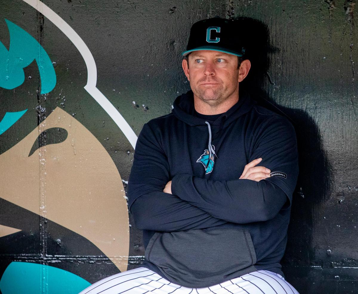Coastal Carolina Associate Head Coach Kevin Schnall watches as players warm up ahead of the Chanticleers’ Sunday afternoon matchup against Virginia Tech. The game was cancelled as rain clouds continued to move in.