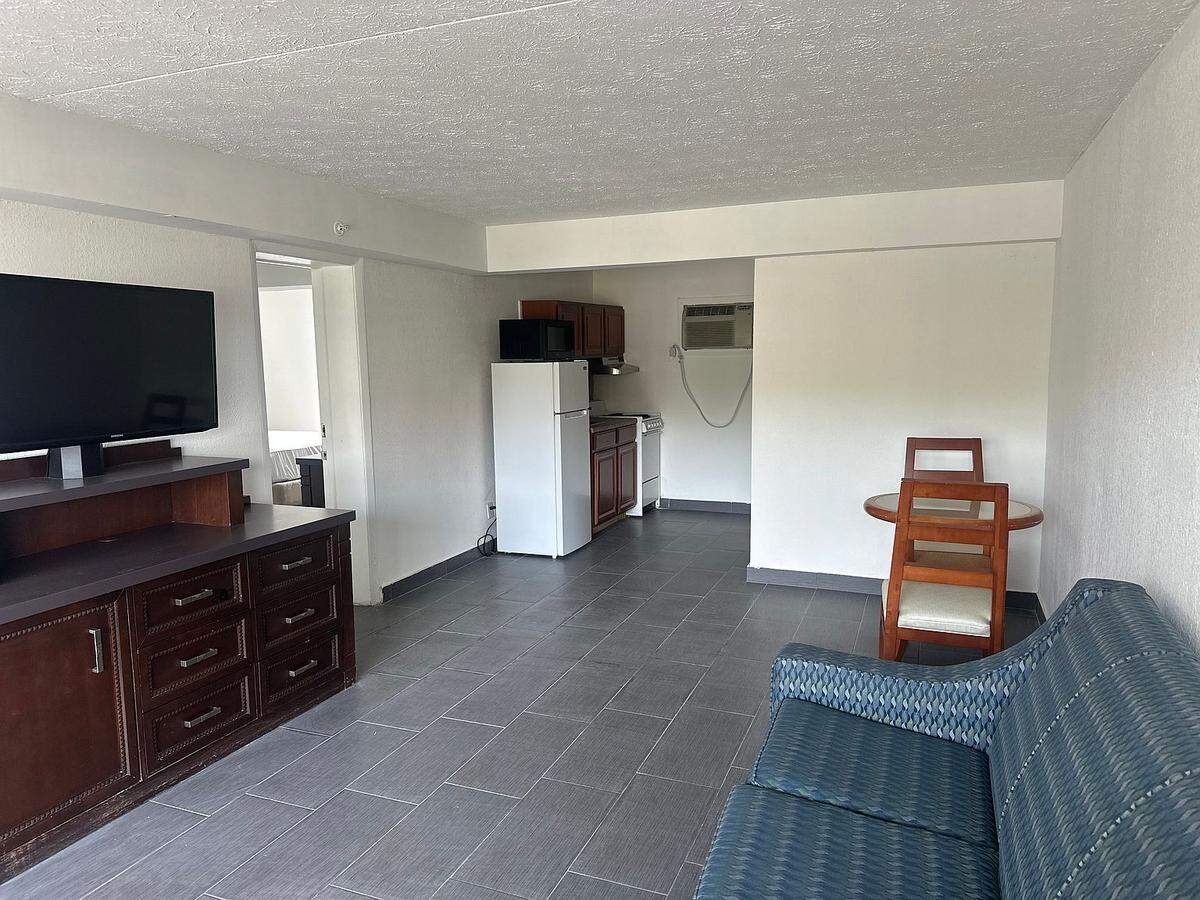The inside of a one-bedroom unit at the Ocean Breeze Hotel. It first opened as a hotel in the 1960s but was turned into an apartment building, a Zillow listing shows.