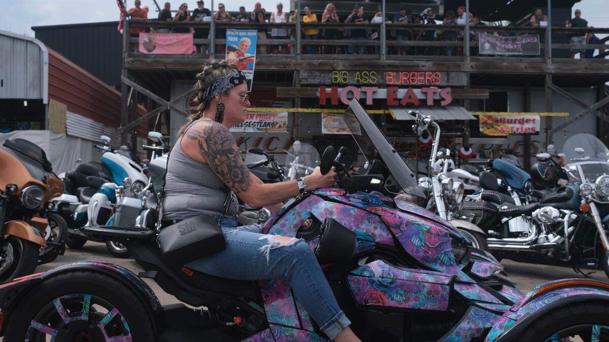 Bikers hang out at Spokes and Bones Saloon in Murrells Inlet, S.C. on Friday during the 2024 Myrtle Beach Spring Rally. May 17, 2024.