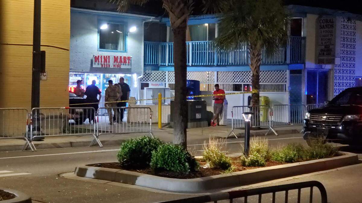 Myrtle Beach police investigate outside the Coral Sands Mini Mart on Ocean Boulevard on June 24.