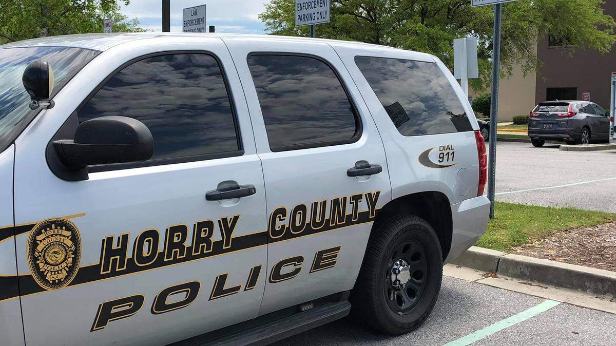 Horry County Police are investigating the death of a woman who was found in a pond near her house.