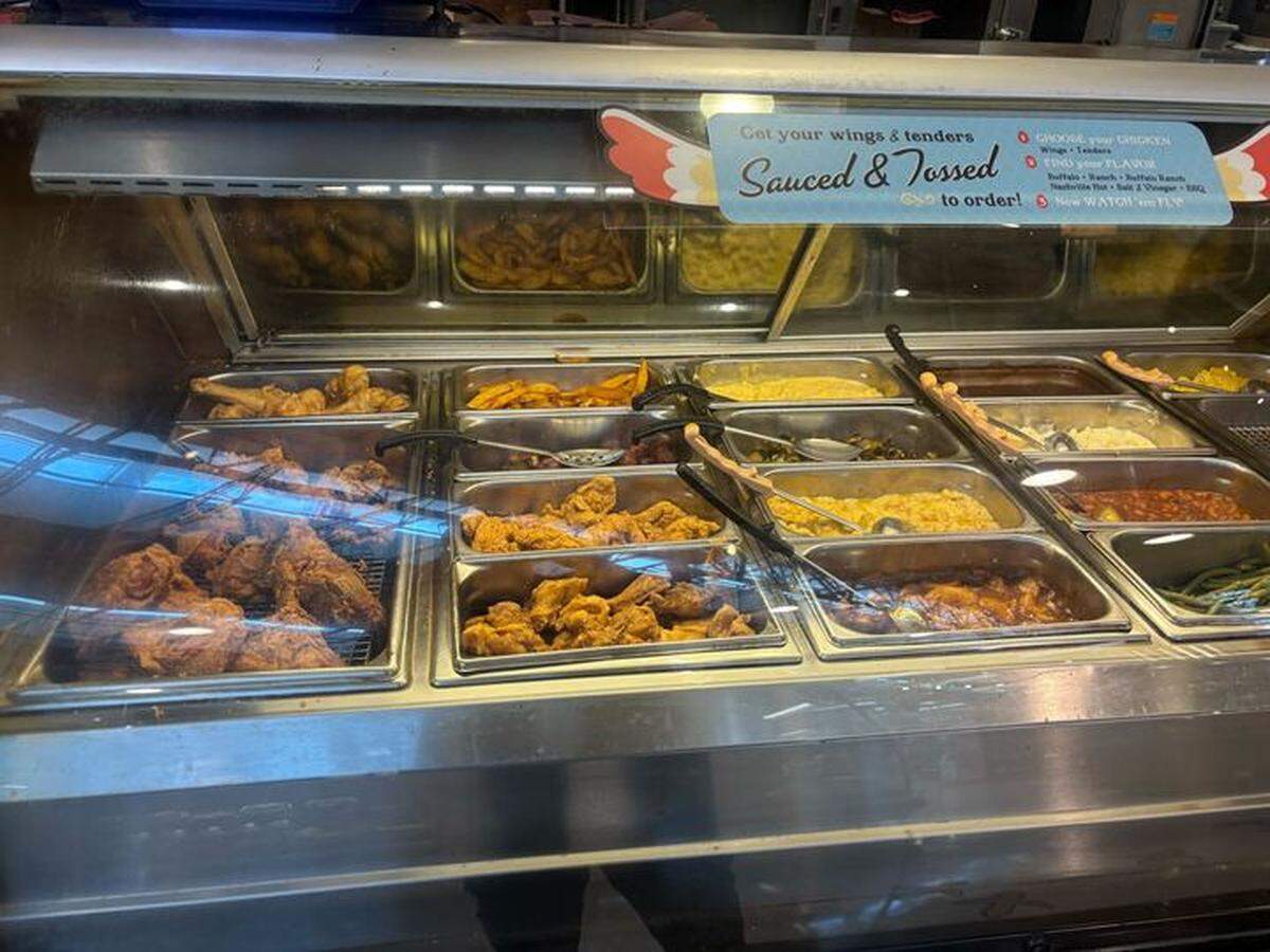 The Lowes Foods deli serves fried chicken and southern sides including macaroni and cheese and spiced apples.