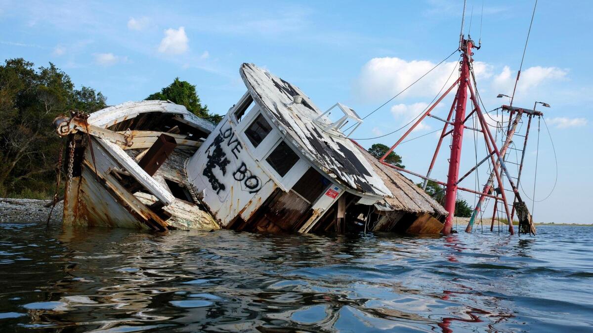 An abandoned shrimp boat called ‘Sum Day’ that was wrecked on the shoreline of the Intracoastal Waterway between Little River and Calabash, was removed in a joint effort by the South Carolina Natural Resources, the conservation group Wounded Natural Working Veterans, and local volunteers from Black Water Dredging in 2021.