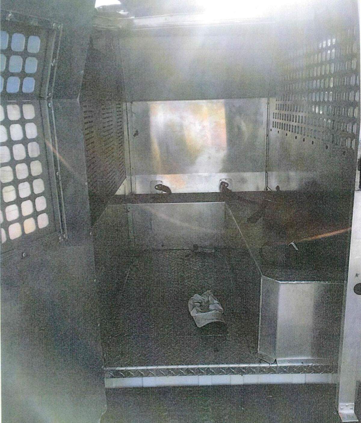 The inside of a Horry County Sheriff transport van shows the area where two women drown after the vehicle was swept in flood waters in Marion County on Sept. 18. The hat on the ground belonged to Nikki Green.