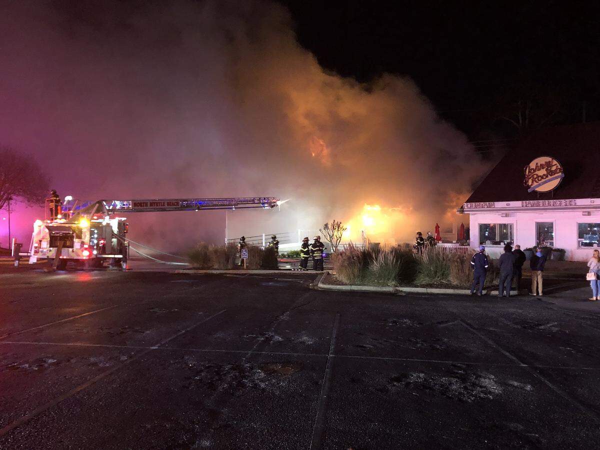 A fire engulfed at least one building at Barefoot Landing late Friday.