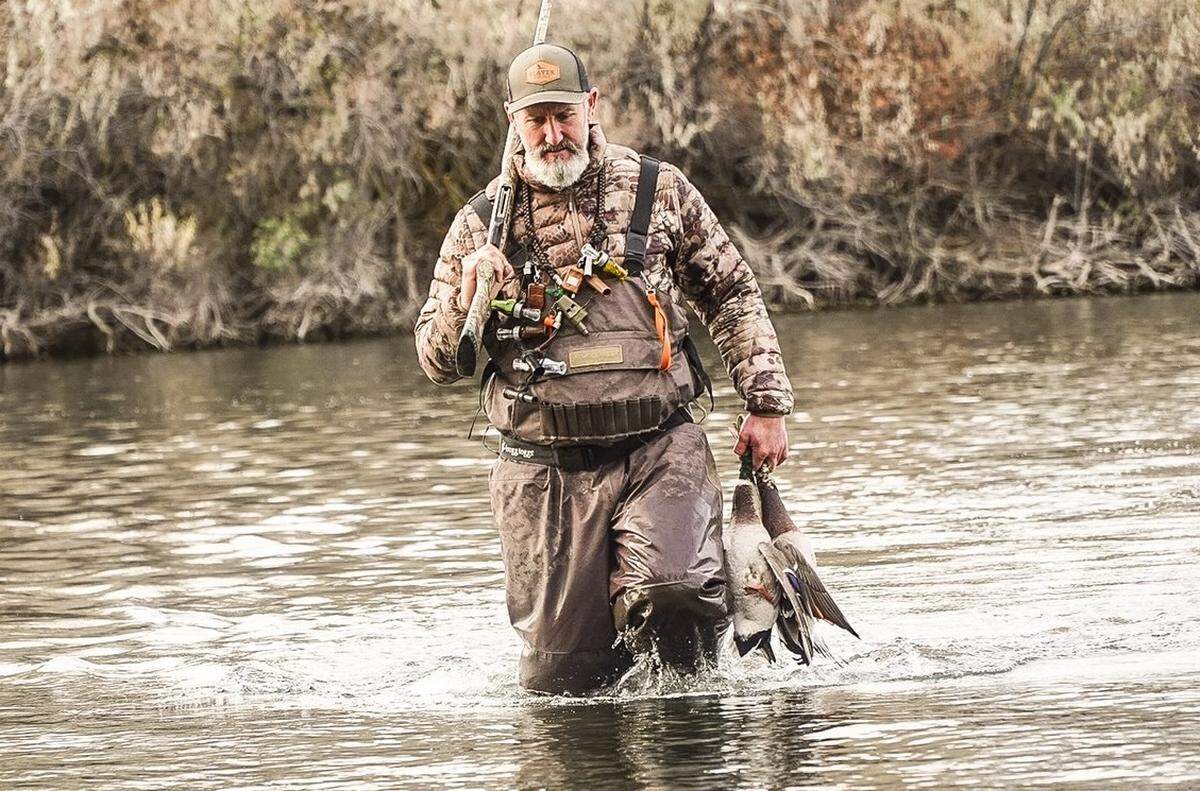 Hunter wears chest waders similar to those belonging to missing boater Tyler Doyle. The Loris man disappeared on January 26 while duck hunting near Little River, S.C. Photo from Slayer Calls website. February 1, 2023.
