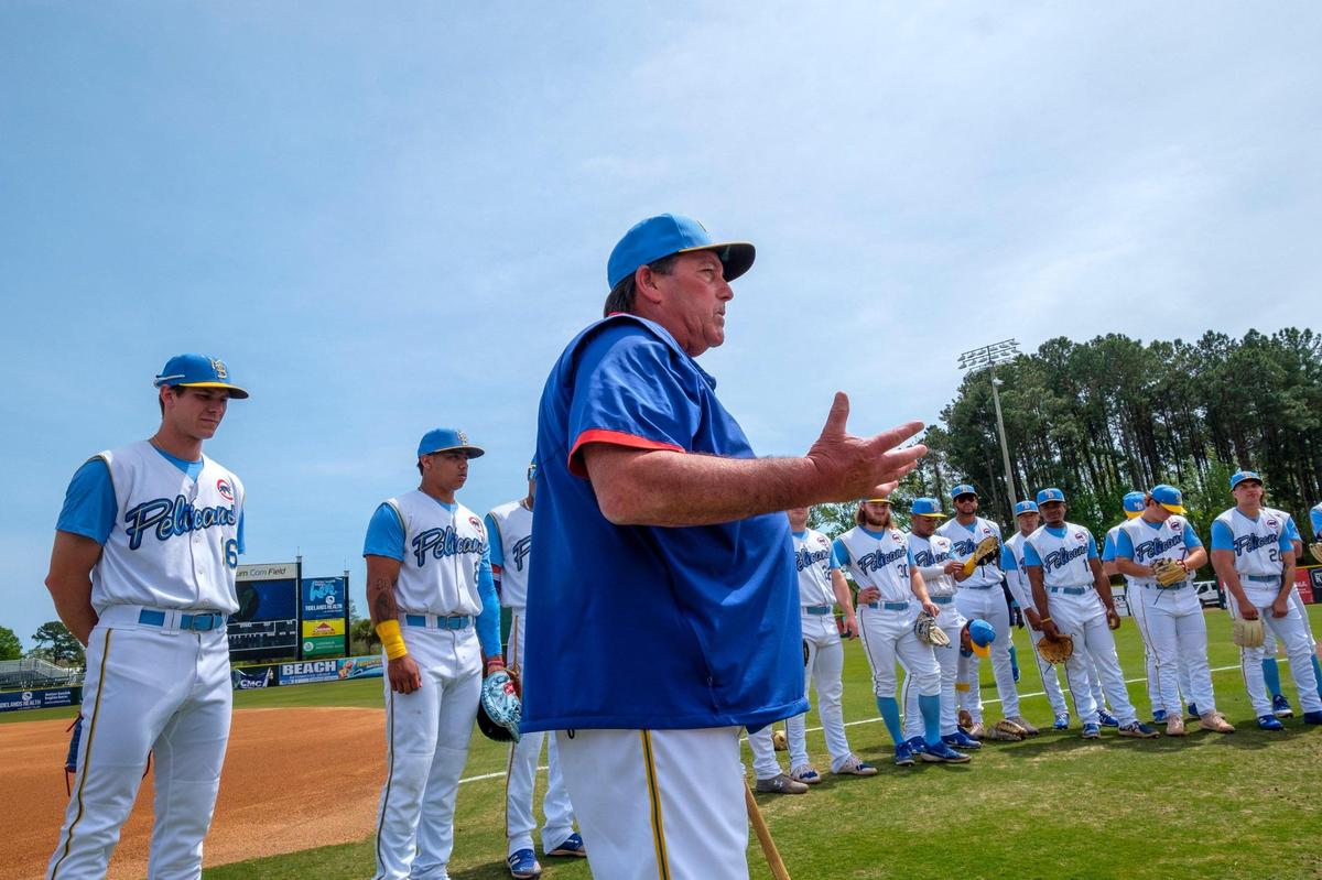 Myrtle Beach Pelicans manager Buddy Bailey talks to his team prior to practice on April 5, 2022.
