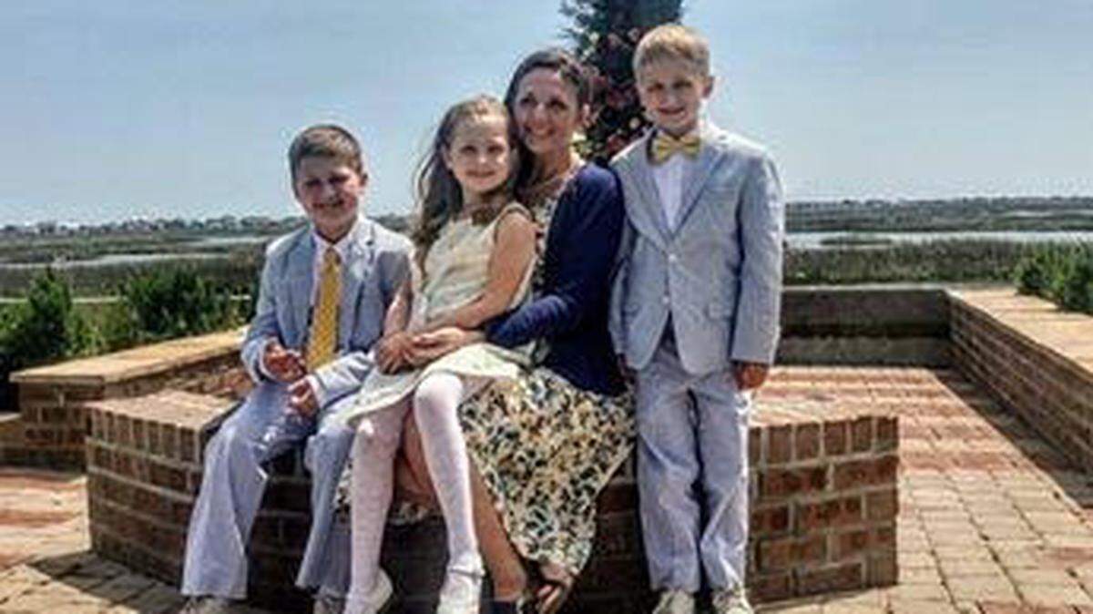 The late Jessica Hill-Doehner with her children, Liam, Bella and Aden, on the banks of Murrells Inlet behind Belin United Methodist Church.