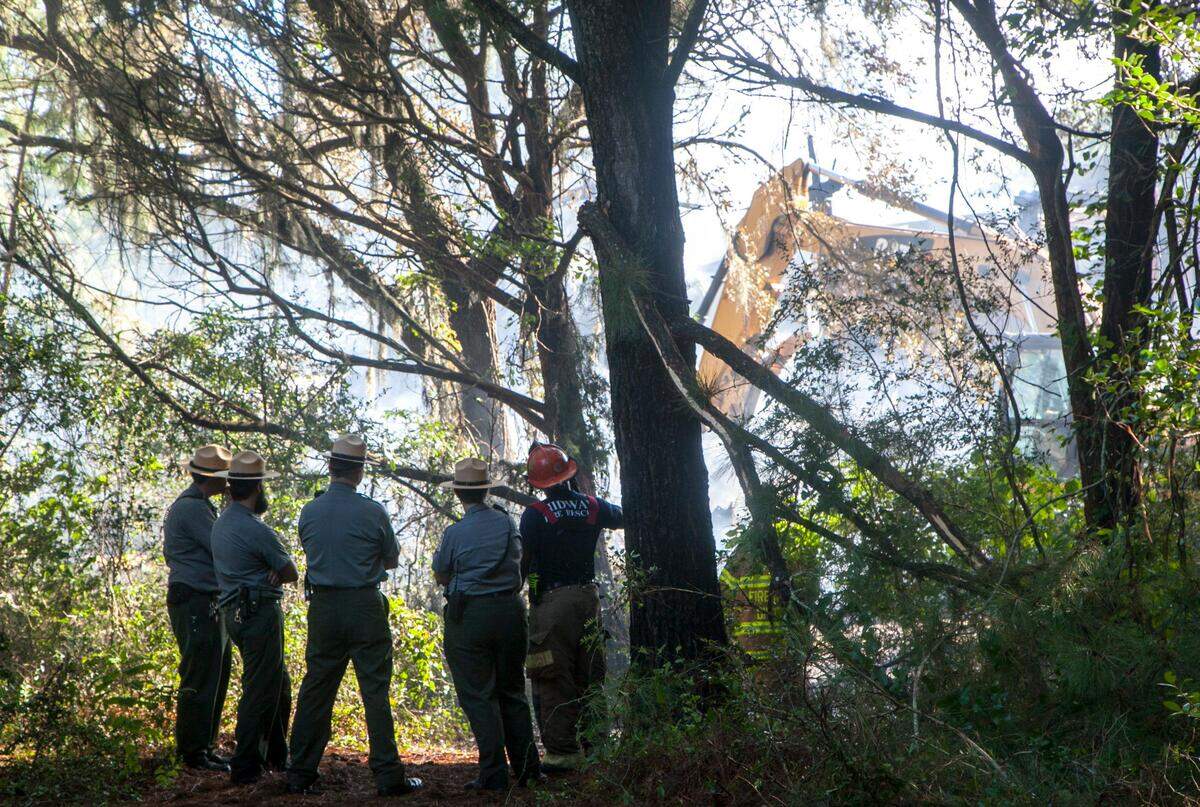 The Nature Center at Huntington Beach State Park was consumed by fire in the early morning hours of Wednesday, July 20, 2016. Crews from multiple fire departments responded to the blaze. Firefighters and Park Rangers are still on the scene spreading debris to put out the last hotspots and investigating the blaze.