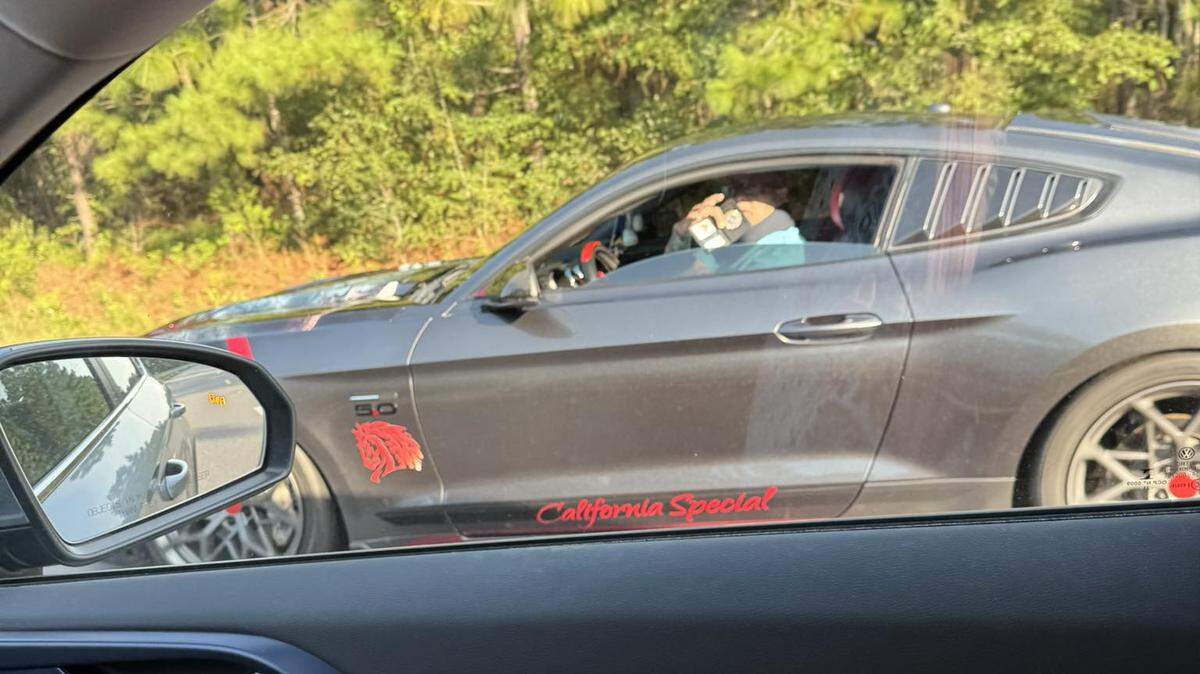 A man flashes a police badge while driving on Highway 17 South in Georgetown County. Ginger Maston, who took the photo, said the man was driving erratically, and her husband later encountered the same man showing a badge despite not being an officer. Police documented the second encounter, but the man wasn’t charged with impersonating an officer.