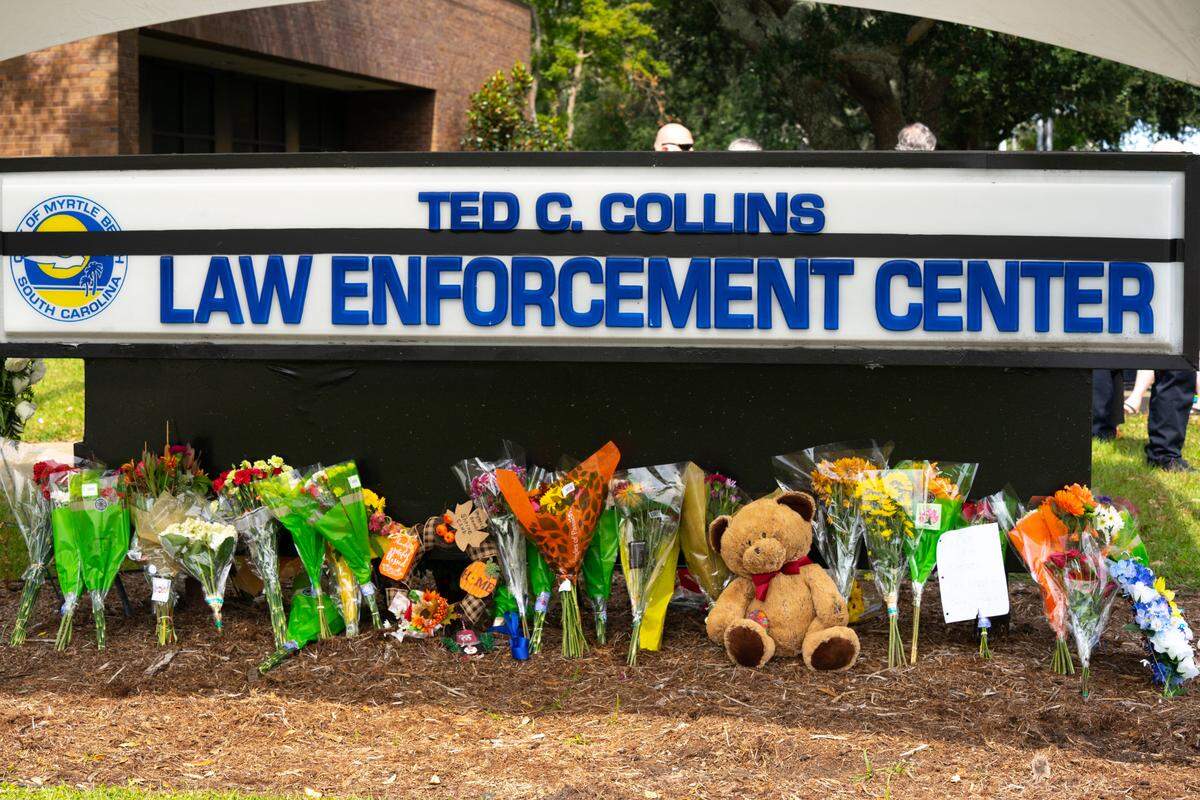 A temporary memorial outside the Myrtle Beach Police station.