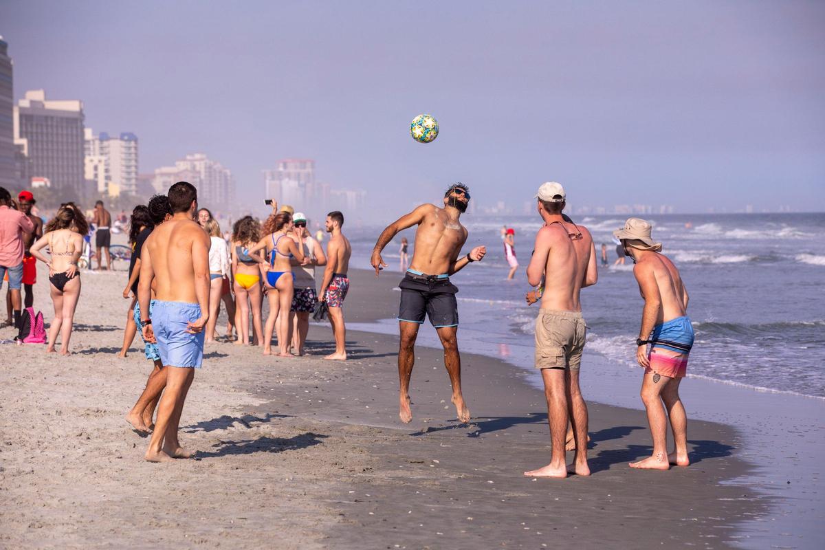 With government officials warning people to take caution and self quarantine, over a hundred college students were partying on 65th Avenue North in Myrtle Beach on Thursday. March 19, 2020.