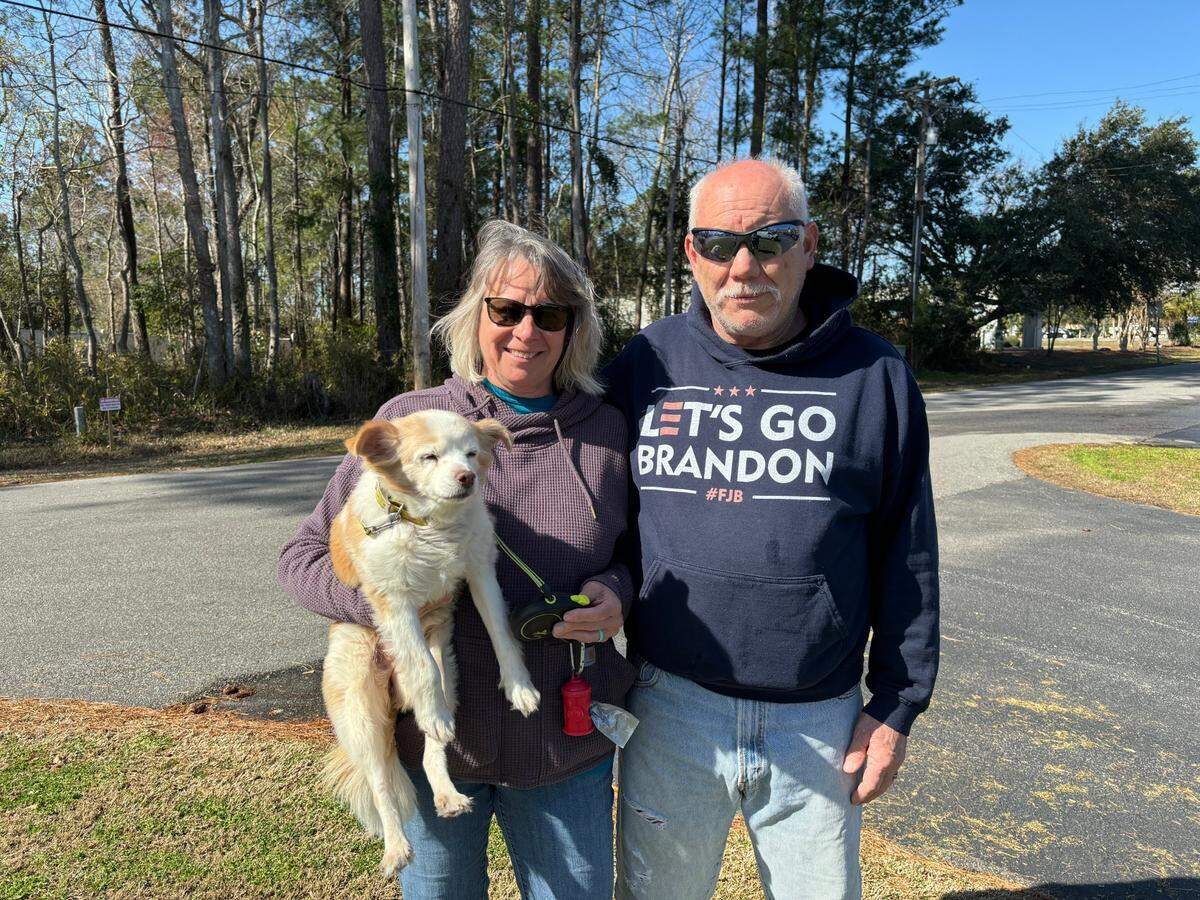 Warren Lilly, right, and Carolyn Lilly, right, with their dog Milly. Warren said he voted for Donald Trump in the GOP primary and wore a Let’s Go Brandon sweatshirt to show his support for the presidential candidate. He had to flip up his sweatshirt in order to vote as people are not allowed to wear political gear into the polls.