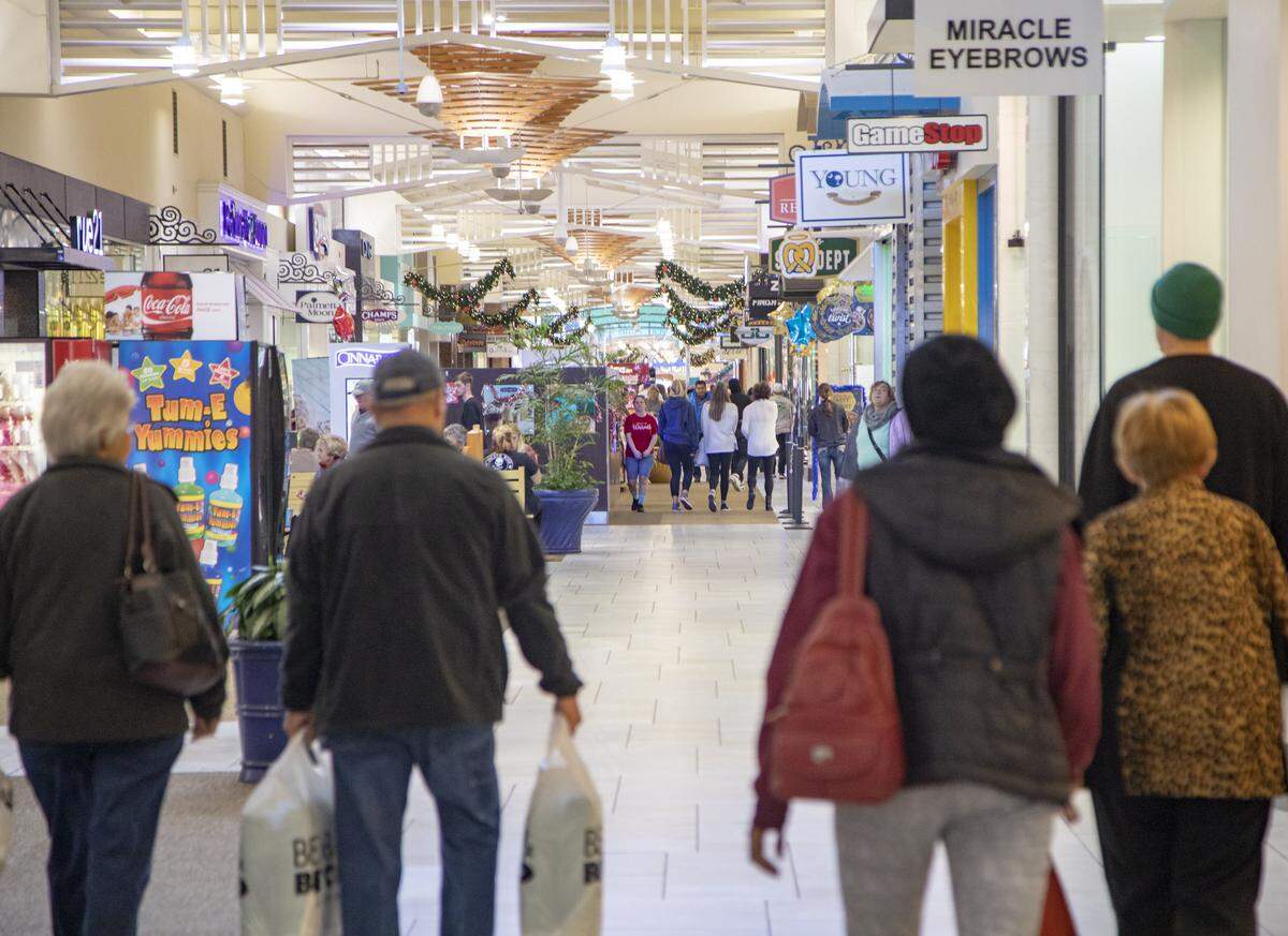 Black Friday shoppers walk through the hallways of Coastal Grand Mall in Myrtle Beach Friday.
