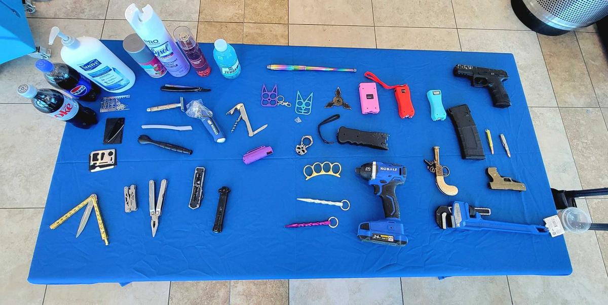 A Transportation Security Administration display at Myrtle Beach International Airport lays out items prohibited through security checkpoints. Feb. 25, 2025.