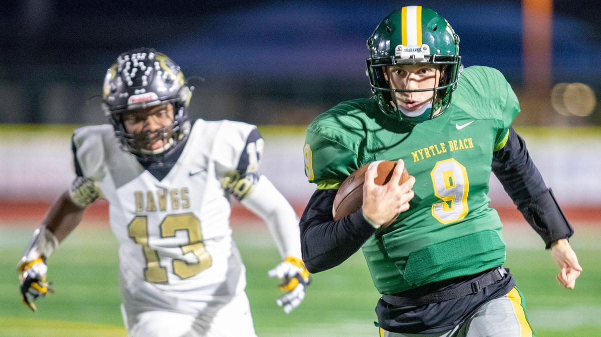 Myrtle Beach junior quarterback Luke Doty scrambles against the Marlboro County Bulldogs Friday night at Doug Shaw Memorial Stadium.
