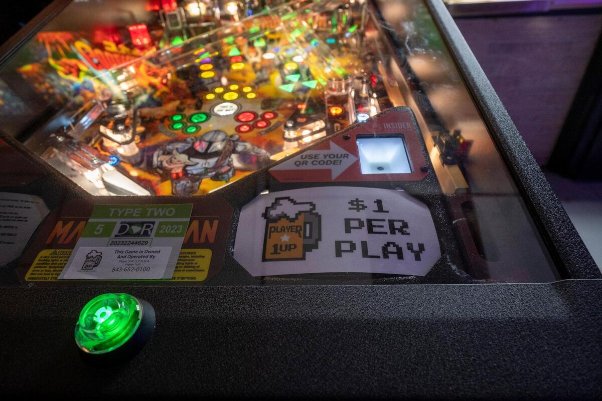 The Player 1UP arcade bar has opened in Murrells Inlet featuring classic coin operated arcade games that date back to the early 1980s, pinball machines, billiards tables, air hockey, Skee-Ball, NBA Hoops, racing games and shooting games. It also has a rooftop bar. May 13, 2022.