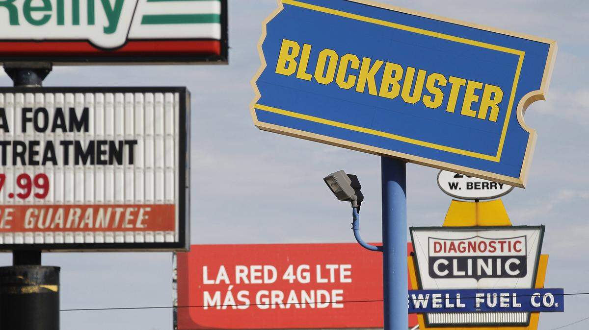 The video rental chain Blockbuster will close the remaining 300 U.S. stores. In this photo, a Blockbuster sign in Fort Worth, Texas, is shown on Wednesday, Nov. 6, 2013. (Ron T. Ennis/Fort Worth Star-Telegram/MCT)
