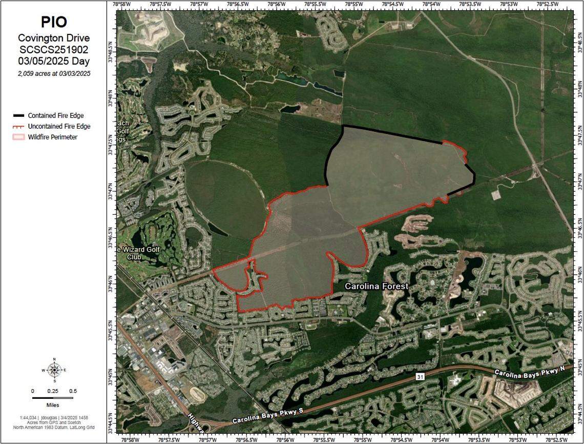 An updated map from the South Carolina Forestry Commission shows the wildfire in Carolina Forest in the Myrtle Beach, SC area. The black line indicates a contained fire edge.