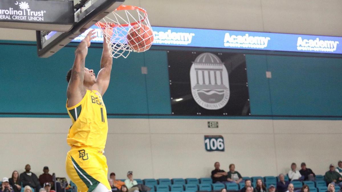 Baylor junior forward Mark Vital dunks during the Bears’ 76-53 win over Ohio in November 2019 in the first round of the second Myrtle Beach Invitational at the HTC Center in Conway.