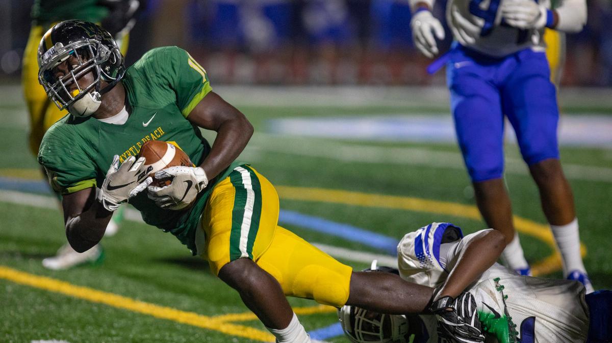 Myrtle Beach senior running back Jermani Green runs the ball against the Dreher Blue Devils Friday night at Doug Shaw Memorial Stadium. Green had 276 yards and five touchdowns on 24 carries in the game.