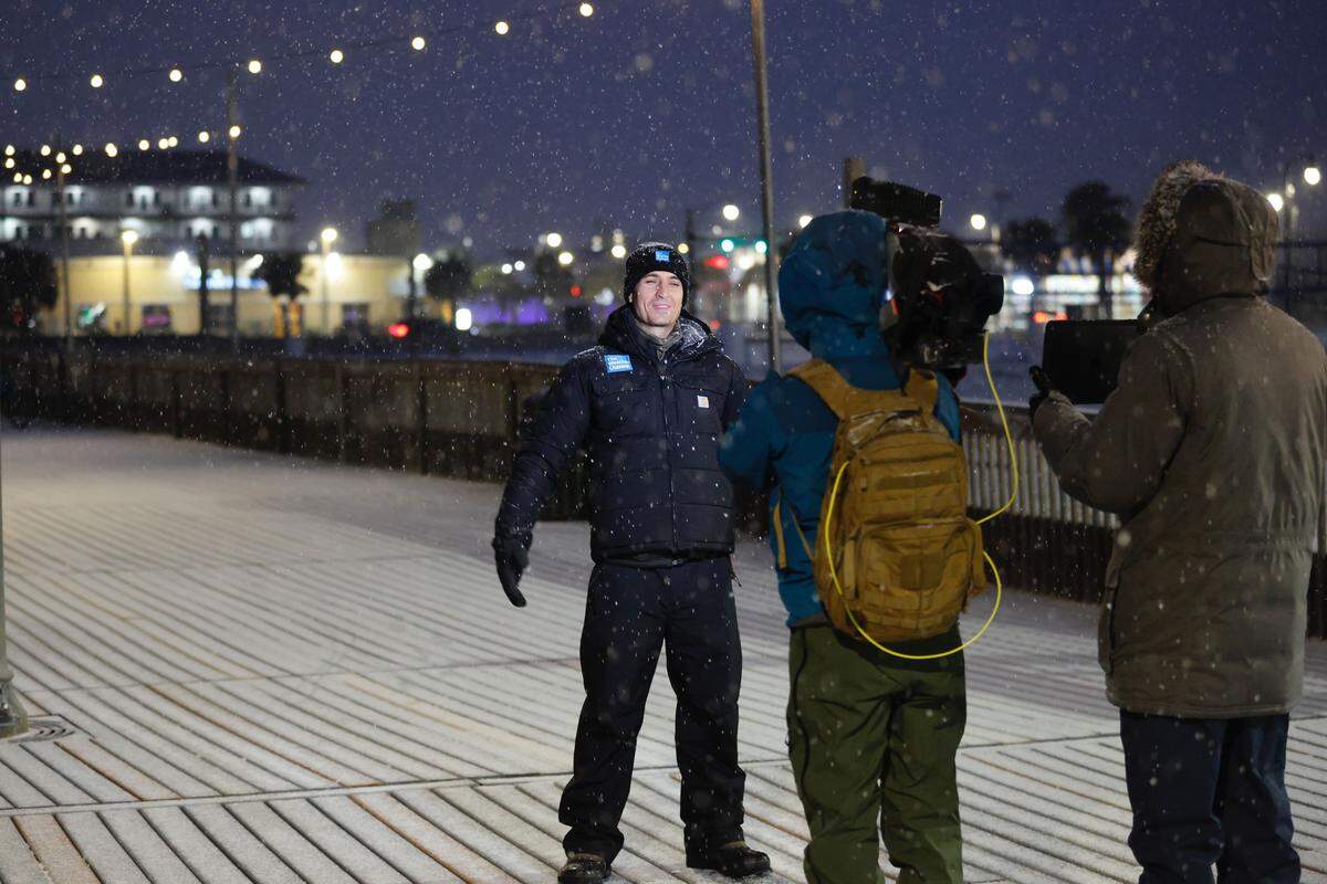 Jordan Steele with The Weather Channel was on the Myrtle Beach boardwalk Saturday evening, Jan. 31, 2026, as snow began to cover the coastal city. The Myrtle Beach, SC, area is preparing for a weekend storm that will dump up to a foot of snow and bring extreme cold temperatures.