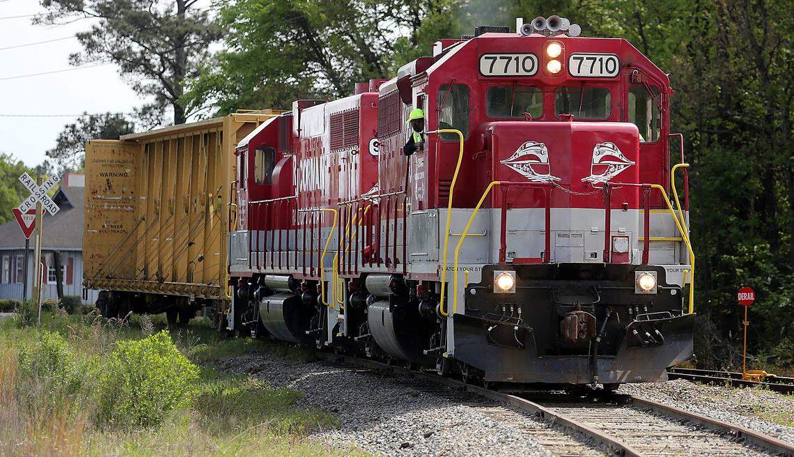 For the first time in several years, a train runs Horry County tracks to Canfor in Conway on Wednesday, April 6, 2016. R.J. Corman Railroad Company ran two engines to Canfor, picked up a car, stopped at the Conway Depot to pick up a few more old engines and headed back to Marion County. The last time the tracks were used was 2011.