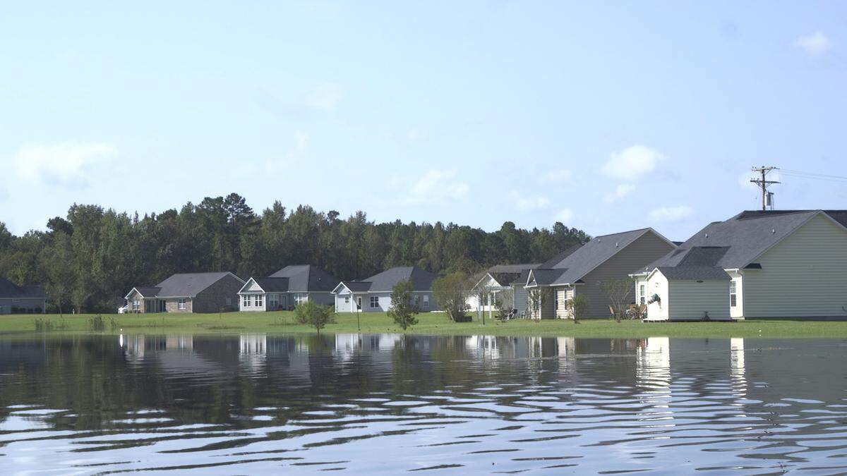 Homes face flooding from the Wacammaw River in Pecan Groove subdivision in Conway.