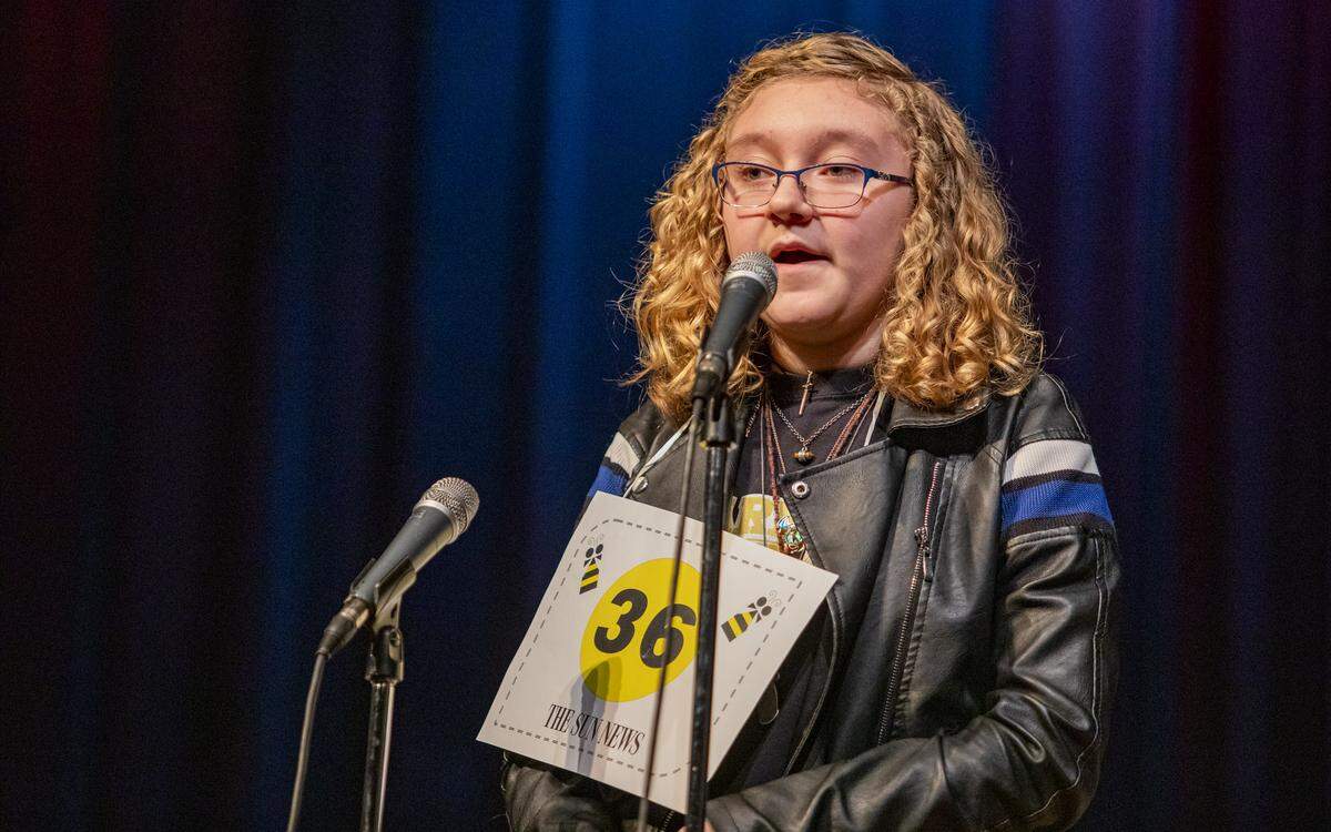 Socastee Middle School seventh grade student Magnolia Moran spells a word during the Regional Spelling Bee at St. James High School Saturday afternoon. Moran placed second in the spelling bee behind Ocean Bay Middle School’s Alex Nikolav.