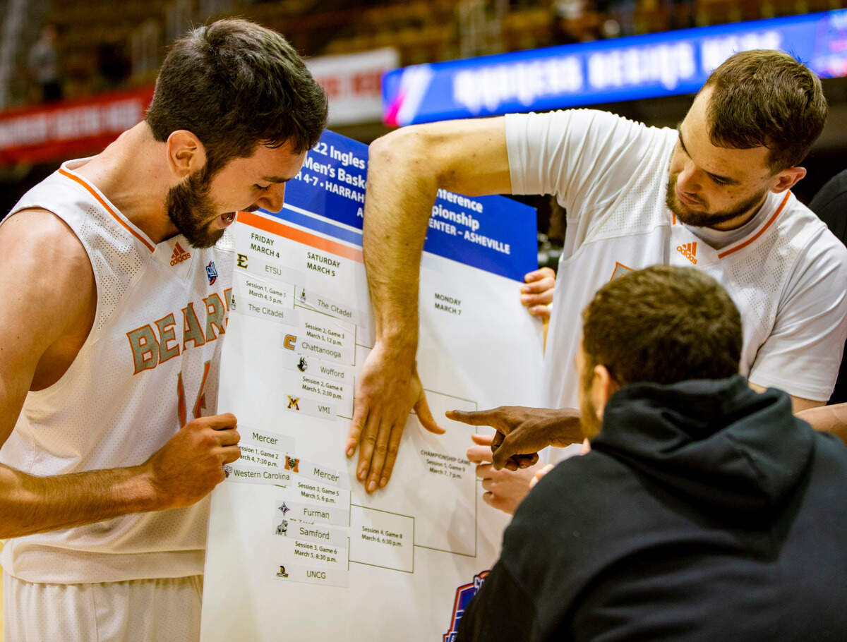 Mercer celebrates after defeating Western Carolina 81-53 Friday night in the SoCon Ingles Basketball Championships at the Harrah’s Cherokee Center in Asheville, N.C.