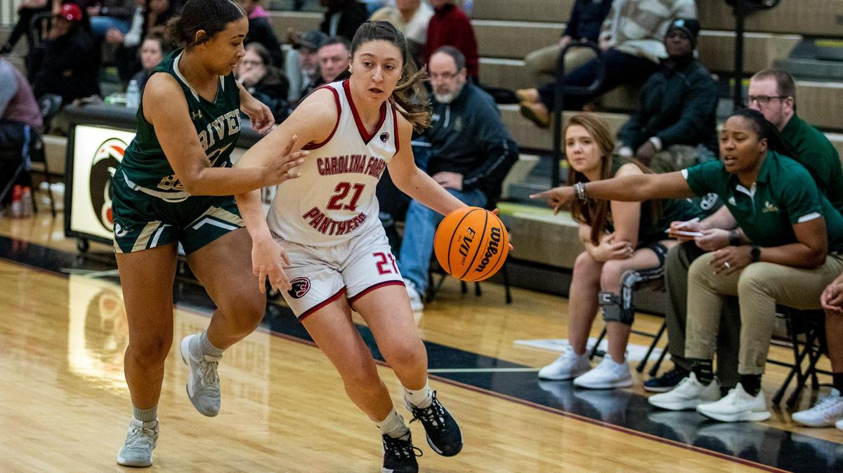 Carolina Forest junior guard Ally Niles drives the ball down the court as the Panthers take on River Bluff Friday night at Carolina Forest High School.