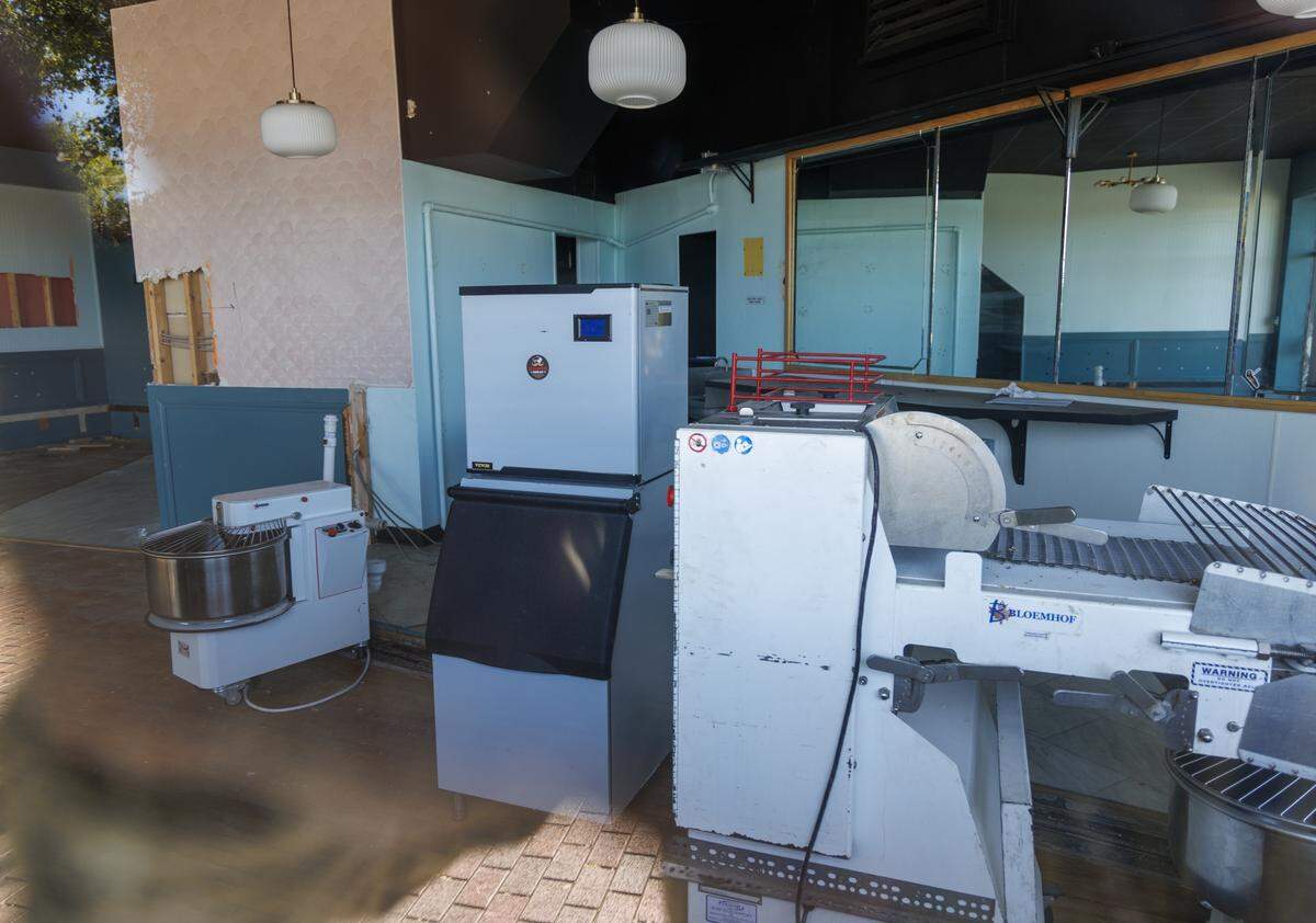 Restaurant equipment, including some bearing the logo of Le Manna Bread, was stored at 819 Main Street on Friday afternoon.