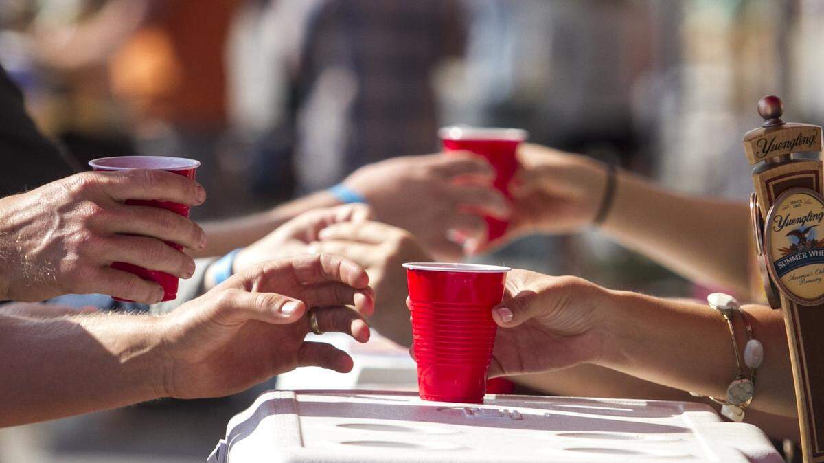 In this Sun News file photo, visitors to downtown Conway enjoy adult beverages at the city’s 30th annual RIvertown Music & Craft Beer Festival.