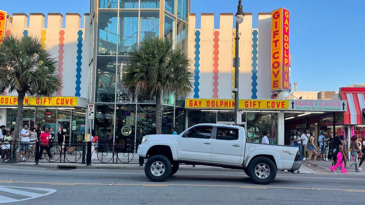 Drivers of squat trucks cruise along Ocean Boulevard of Myrtle Beach Saturday night. The trucks are under fire by police and state legislators for safety reasons. April 15, 2023