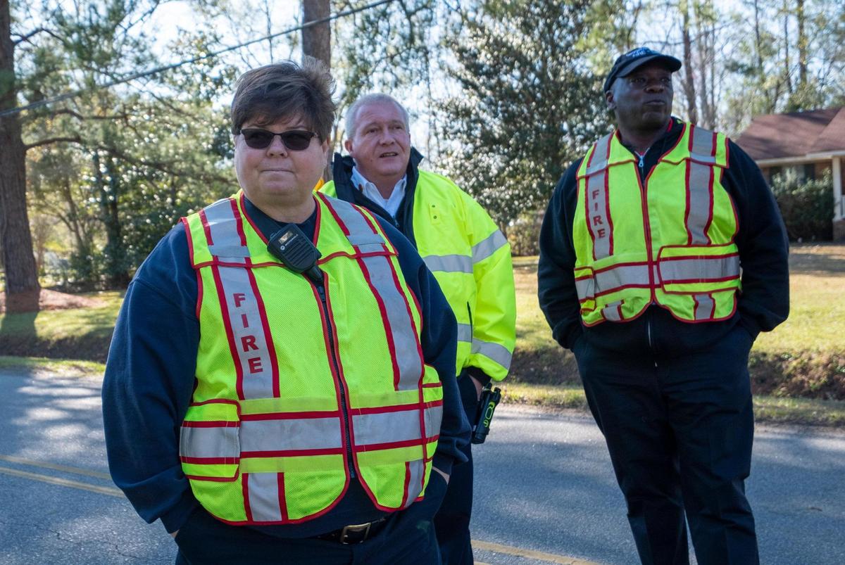 Georgetown County Fire and EMS Deputy Chief Deborah Johnson, Assistant Chief Tony Hucks, and Chief Mack Reed stand watch over efforts to stop a gas leak near Georgetown. Staffing shortages at Georgetown County Fire have resulted in only having one firefighter per station or truck, well below national safety standards. February 7, 2020.