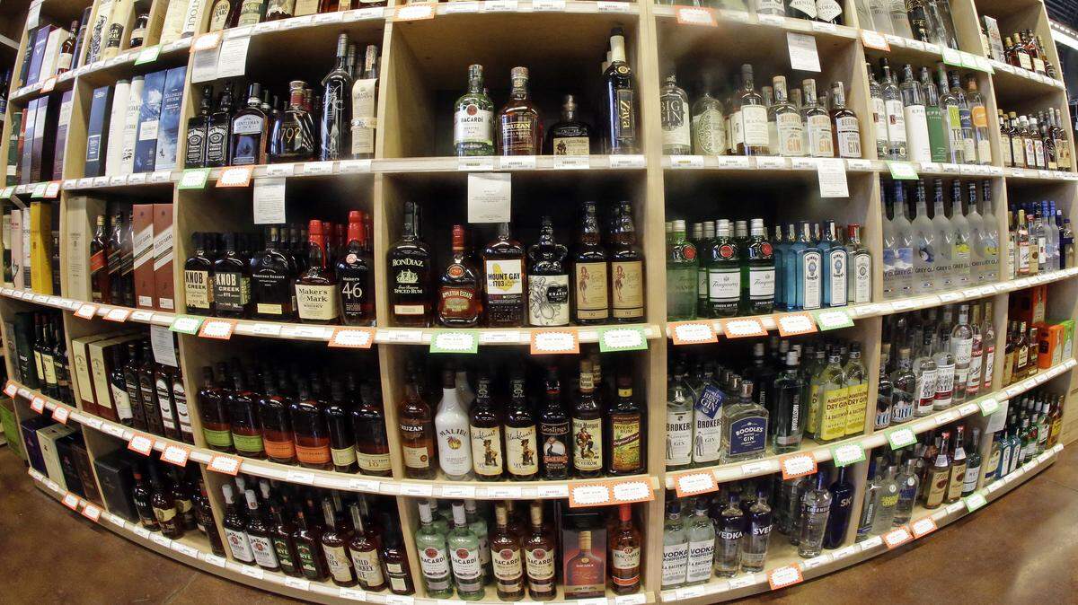 This June 16, 2016 file photo made with a fisheye lens shows bottles of alcohol during a tour of a state liquor store in Salt Lake City.