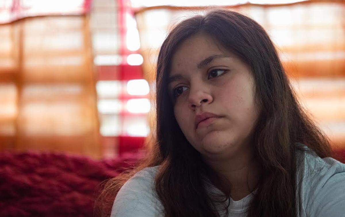 Aurora Magallanes listens as her mother recounts the night members of the Myrtle Beach Police Department busted down her family’s front door with a battering ram. Police later admitted that they had the wrong address, as only Magallanes and her two children were inside.