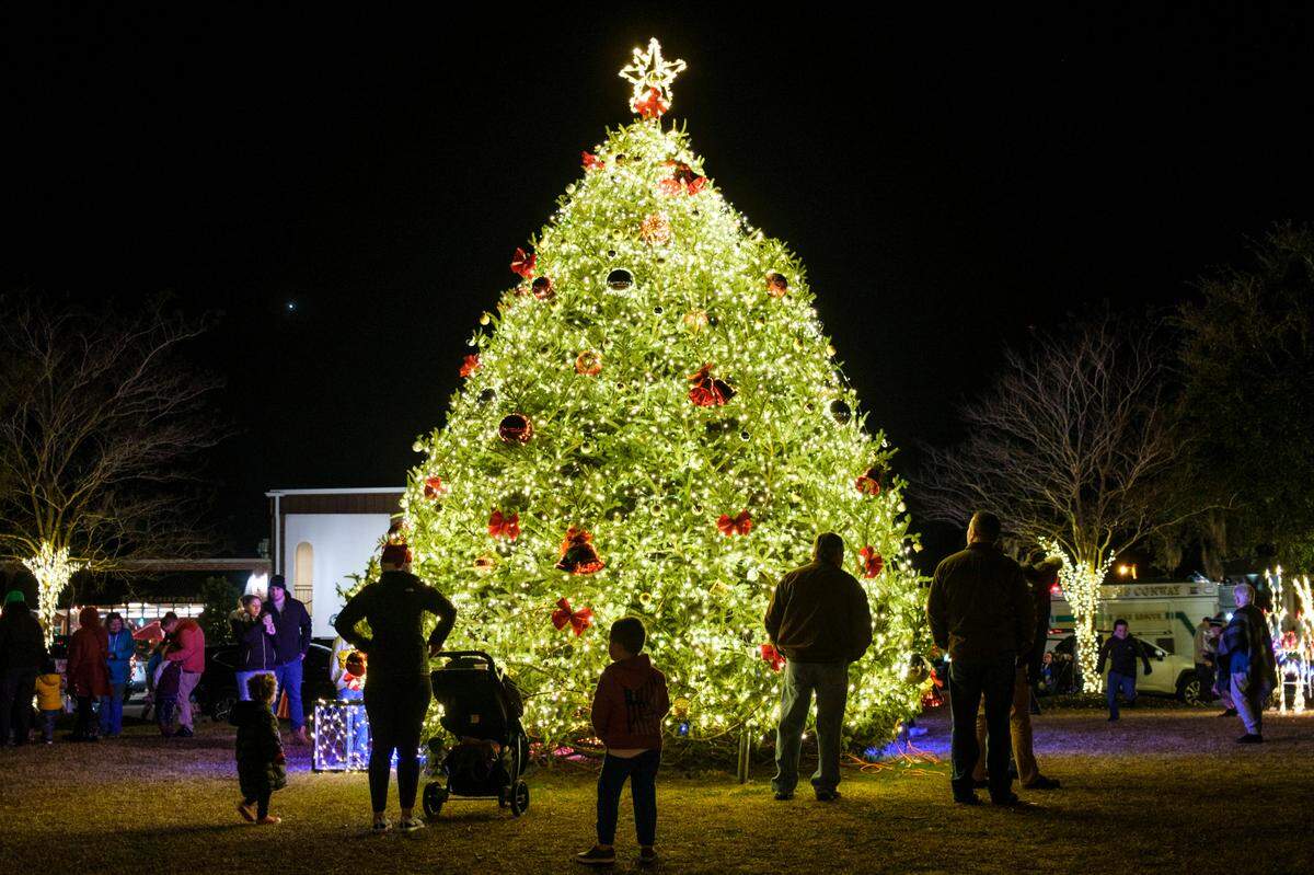 Conway S.C. held the annual “Living Window” displays amid holiday festivities that included camel and horse drawn carriage rides, and live entertainment Thursday night. The historic river town has become a holiday destination for locals and visitors. Dec. 9, 2021.