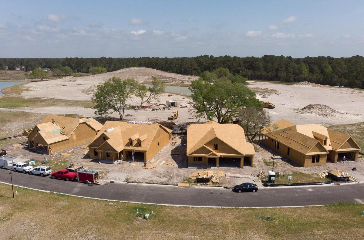 Contractors work on new homes under construction at Bridgewater off Hwy 9 in Little River. New homes and apartments are being built across Horry County to accommodate an expected 500,000 thousands residents by the year 2040. Apr 28, 2019.