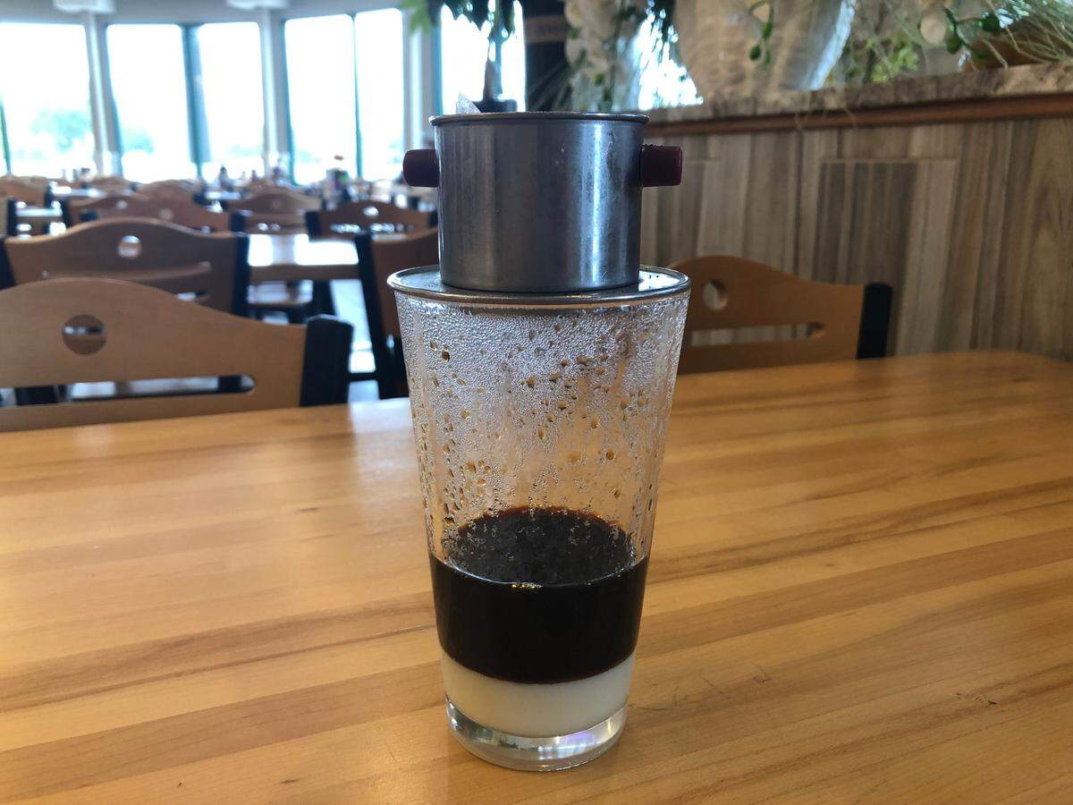 Vietnamese coffee brews over sweetened condensed milk at Pho Claire in Myrtle Beach, S.C. Coffee fans can try brews from around the world for National Coffee Day. Sept. 27, 2023.