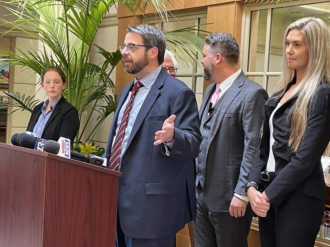 Attorney Tristan at a press conference Nov. 13, 2025, explains the lawsuit filed on behalf of his clients, former Horry County Police Investigator Kelsey Manemeit (right) former county spokeswoman Mikayla Moskov (left). They’re suing former Horry County Deputy Administrator Randy Webster, HCPD and its chief for sexual harassment and defamation after they were forced to resign and had their reputations harmed.