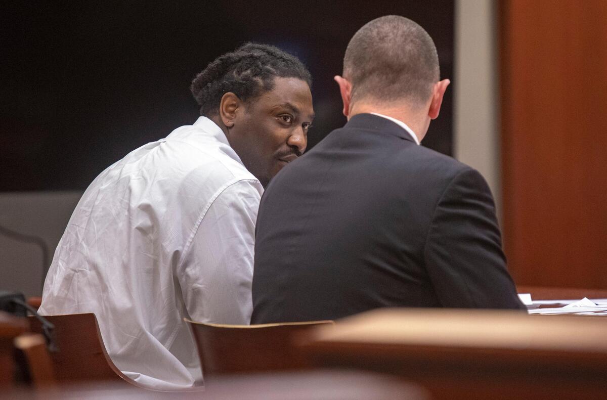 Darrell Deas, 32, of Myrtle Beach speaks with his attorney in court Tuesday. Deas was charged with murder in the 2015 shooting death of 30-year-old Latron Lewis, who died at about 5:15 a.m. in the parking lot of the LaQuinta Inn and Suites on 21st Avenue North in Myrtle Beach.
