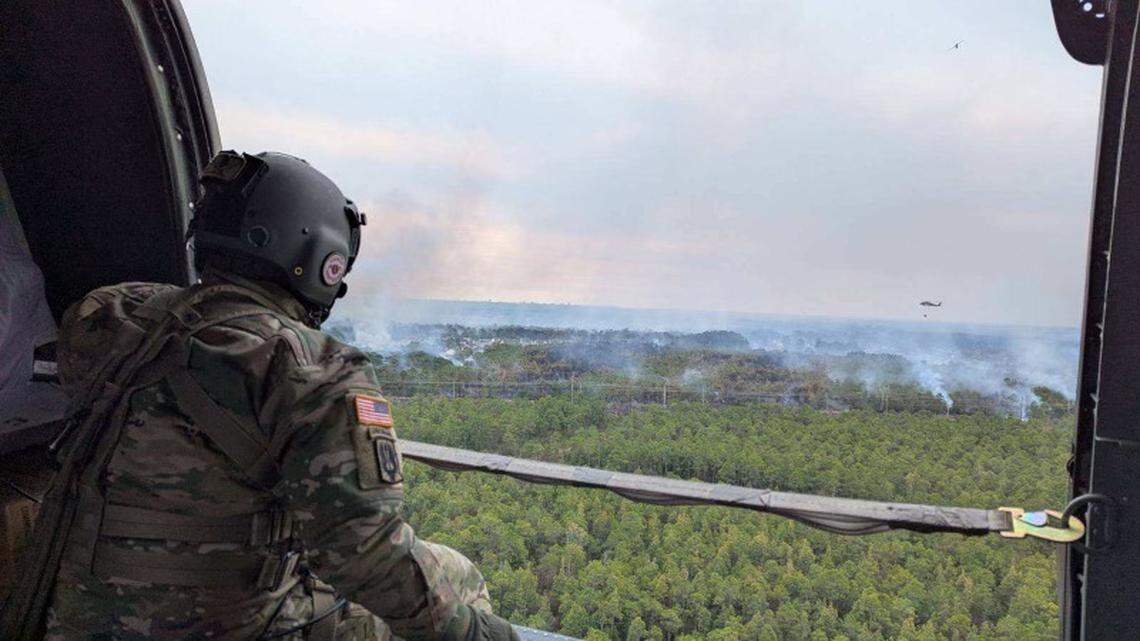 Blackhawk helicopters with the South Carolina National Guard on Sunday began dropping water onto wildfires in the Myrtle Beach area. This photo shows the extent of the wildfires from above.