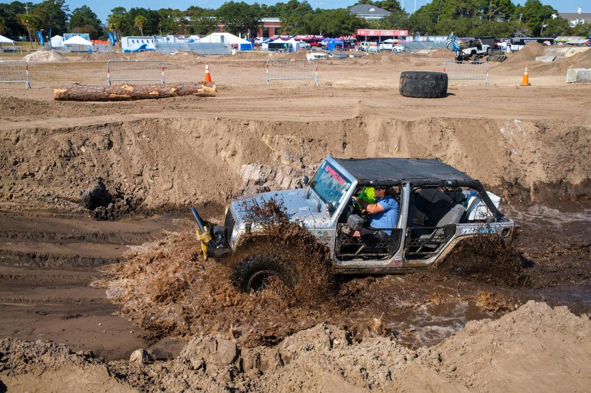 Jeep Jam volunteer, “Hippy” Mike Rabon, tests his jeep in the mud pit prior this weekend’s Jeep Jam event. Preparations are being completed today for the 2024 Jeep Jam event being held at the former Myrtle Square Mall site this weekend in Myrtle Beach. The event features a range of obstacles for Jeep owners to test their vehicles. Oct. 24, 2024.