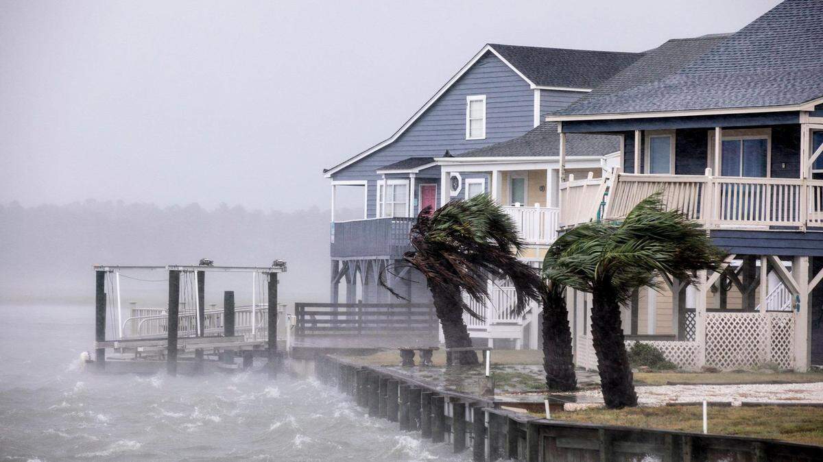 Waves lash a seawall at Cherry Grove in North Myrtle Beach. The effects of Hurricane Florence hit the area in September 2018. North Myrtle Beach home owners pay some of the highest insurance rates in South Carolina.