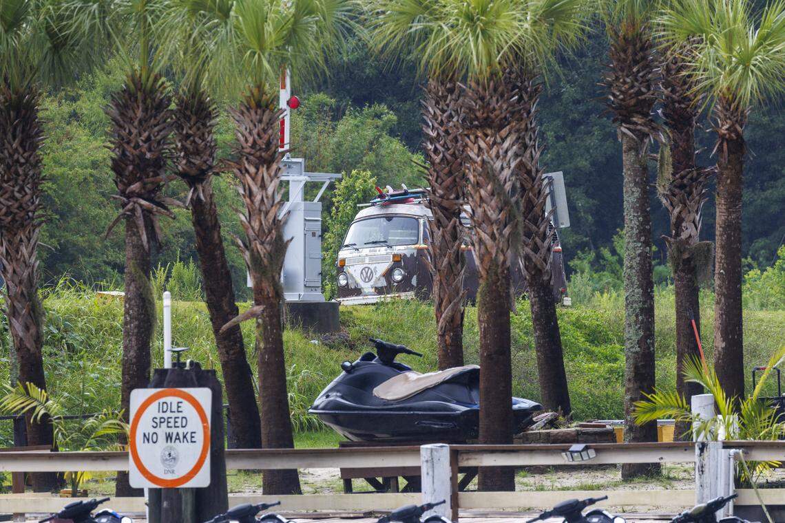 Despite rain storms, crowds gather on the waterfront walkways of Swing Bridge Park in Socastee hoping to catch a glimpse of actors in the Netflix TV show “Outer Banks.” Earlier on Tuesday, Madelyn Cline (Sarah) and Chase Stokes (John B.) could be seen running across the bridge during filming. July 27, 2025.